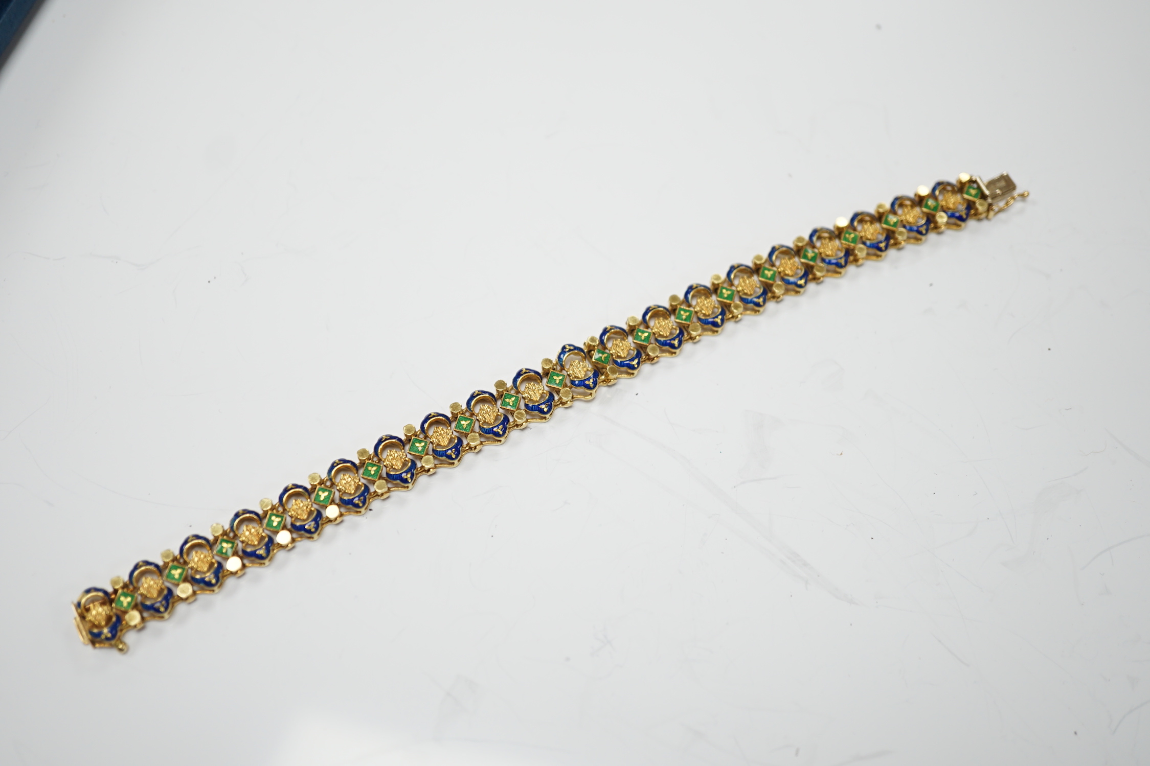 A 20th century Italian Uno-A-Erre 750 and two colour enamel set bracelet, 19cm, gross weight 33.4 grams.